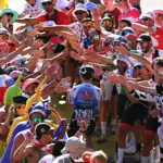 Pogacar conquers Alpe d’Huez in record climb to win stage 19 and extend Tour de France lead