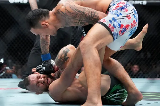 McGregor slipped to the canvas twice before calling off the fight