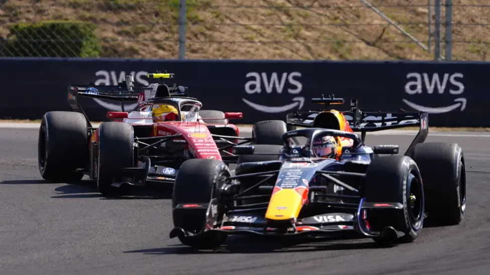 Red Bull's Max Verstappen with Ferrari's Lewis Hamilton behind him during the Hungarian Grand Prix