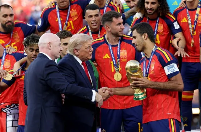 Trump and Fifa president Gianni Infantino presented the World Cup Winner’s Trophy to Spain captain Rodri on Sunday