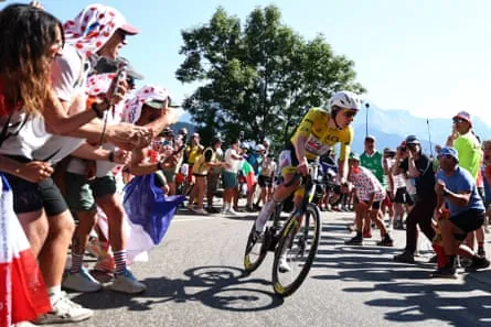 Tadej Pogacar chases down the lead breakaway group on the Alpe d’Huez ascent