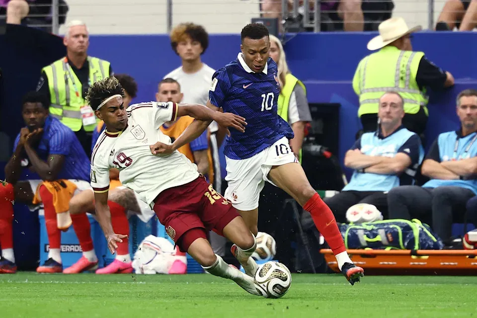 Spain forward #19 Lamine Yamal fouls France forward #10 Kylian Mbappe during the 2026 World Cup football tournament semi-final match between France and Spain at the Dallas Stadium in Arlington on July 14, 2026.(CHARLY TRIBALLEAU, AFP via Getty Images)