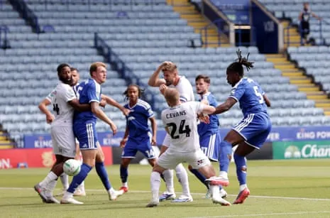 Caleb Okoli heads home to give Leicester City the lead against Northampton Town.